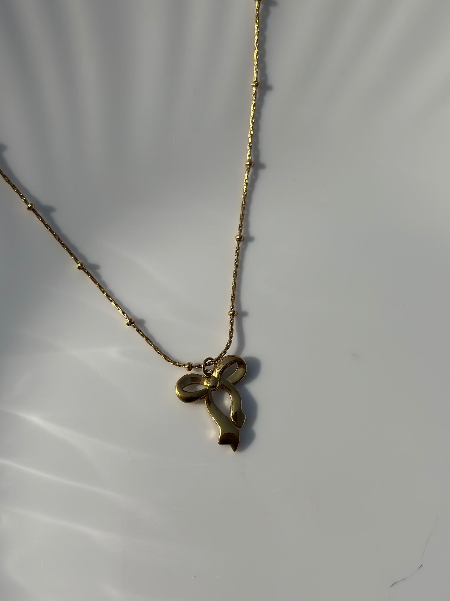 Daisy Bow Pendant